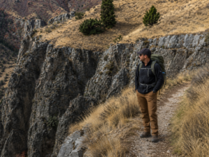 male hiker-rucker in mountains